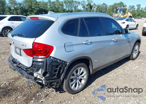 2014 BMW X1 xDrive28I z USA, uszkodzony, nr VIN WBAVL1C55EVY23430